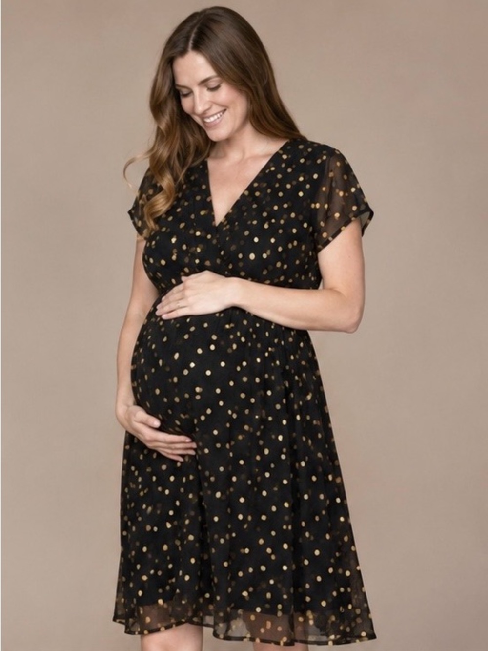Seraphine maternity black and gold polka dot dress